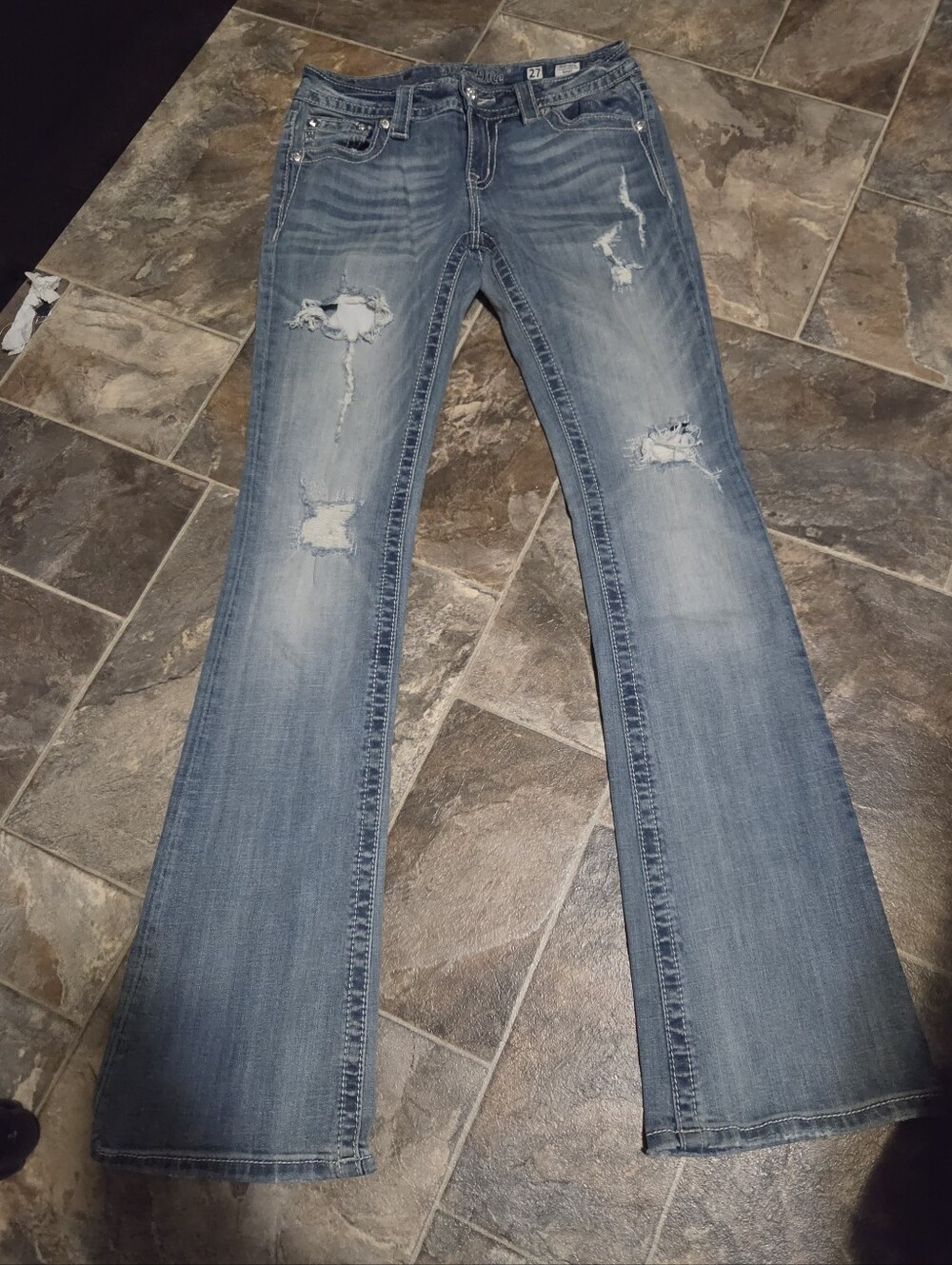 Women's Distressed Light Blue Bootcut Jeans Low Rise to Midrise